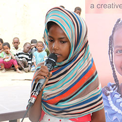 写真：イシラさん、12歳、女の子クラブメンバー（スーダン）