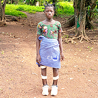 写真：アサナさん、11歳、障害のある女の子（アコナさんの娘）