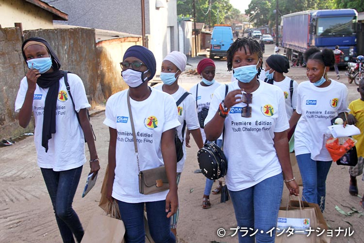 写真：新型コロナウイルスに関する意識啓発活動の様子（ギニア）
