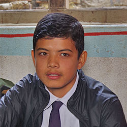 写真：アミットさん、15歳、ネパールの子どもクラブメンバー（災害リスク軽減活動のリーダー