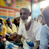 写真：バチャさん、77歳、地域住民