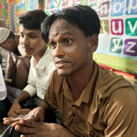 写真：ロヒムさん、41歳、学習スペース管理委員会メンバー