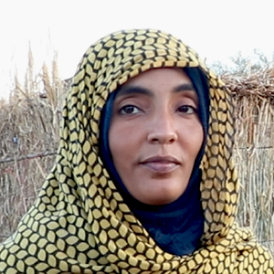 写真：アブドゥルマフムードさん、避難民の女性