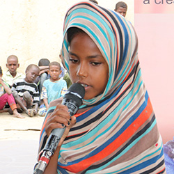 写真：イシラさん、12歳、女の子クラブメンバー（スーダン）